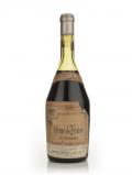 A bottle of Adrien Sarrazin Crème de Fraise de Bourgogne - 1950s
