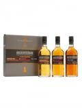 A bottle of Auchentoshan 3 Pack / American Oak,12 Year Old& 3 Wood Lowland Whisky