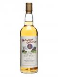 A bottle of Aultmore 10 Year Old / The Scottish Gathering Speyside Whisky