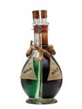 A bottle of Bols Liqueur / 4 Compartment Bottle / 1950s