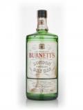 A bottle of Burnett's White Satin Gin - 1970s (Faded Label)