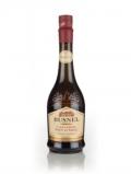 A bottle of Busnel Trois Lys Calvados Pays d'Auge