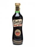 A bottle of Buton Rosso Antico Vermouth / Bot.1970s
