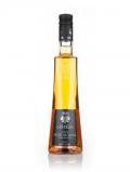 A bottle of Cartron Crème De Pêche De Vigne De Bourgogne (Peach)