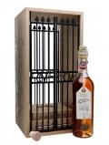 A bottle of Chateau Montifaud 150th Anniversary Cognac with Cage