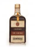 A bottle of Cointreau Crème de Cacao - 1960s