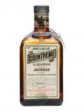 A bottle of Cointreau Liqueur / Bot.1940s
