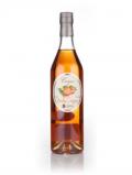 A bottle of Combier Crème de Pêche De Vigne (Peach)