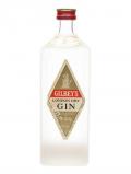 A bottle of Gilbey's London Dry Gin / Bot.1950s