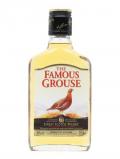 A bottle of Famous Grouse / Small Bottle Blended Scotch Whisky