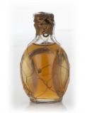 A bottle of Haig Dimple 30 Proof Miniature