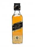 A bottle of Johnnie Walker 12 Year Old - Black Label / Small Bottle Blended Whisky