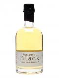 A bottle of Mikkeller Black / Rum Cask