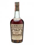 A bottle of Hennessy Bras Armé / Bot.1960s