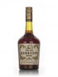 A bottle of Hennessy Bras ArmÃ© Cognac - 1970s