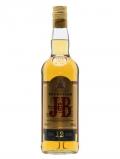 A bottle of J& B Exception / 12 Year Old Pure Malt Blended Malt Scotch Whisky
