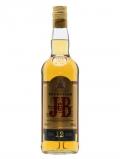 A bottle of J& B Exception / 12 Year Old Pure Malt Blended Malt Scotch Whisky