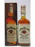 A bottle of Jim Beam White Label Bourbon Old Bottling 4 Year Old