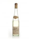A bottle of Les Vieux Donjons Poire William - 1970s