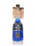 A bottle of Marie Brizard Blue Curaçao - 1980s