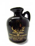 A bottle of Auchentoshan Qe2 Ceramic Jug Miniature 12 Year Old