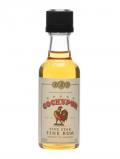 A bottle of Cockspur Five Star Fine Rum Miniature