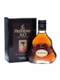 A bottle of Hennessy XO Cognac Miniature