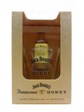 A bottle of Jack Daniels Honey Miniature Branded Tumbler Gift Set