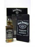 A bottle of Jack Daniels Miniature Apple Iphone 4 Case Gift Set
