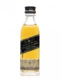 A bottle of Johnnie Walker Black Label 12 Year Old (Plastic) Miniature