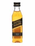 A bottle of Johnnie Walker Black Label 12 Year Old (Plastic) Miniature