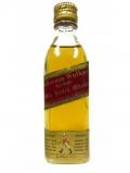 A bottle of Johnnie Walker Red Label Miniature