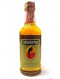 A bottle of Kentucky Distillers I W Harper Kentucky Straight Miniature 4 Year Old