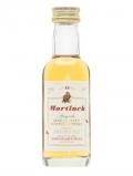 A bottle of Mortlach 15 Year Old Miniature / Gordon& Macphail Speyside Whisky