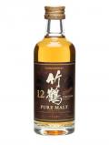 A bottle of Nikka Taketsuru 12 Year Old Miniature Japanese Blended Whisky