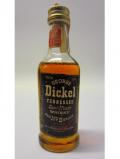 A bottle of Other Bourbon S George Dickel Sour Mash Miniature