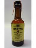 A bottle of Other Bourbon S Seagram S Seven Crown Miniature