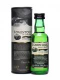 A bottle of Tomintoul Peaty Tang Miniature Speyside Single Malt Scotch Whisky