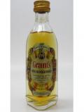 A bottle of William Grant S Stand Fast Finest Scotch
