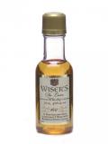 A bottle of Wiser's De Luxe Canadian Whisky Miniature