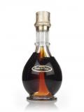 A bottle of Mohawk Four Compartment Liqueur Bottle - 1950s