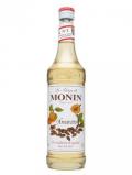 A bottle of Monin Amaretto Syrup