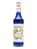 A bottle of Monin Blue Curacao Syrup