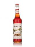 A bottle of Monin Cannelle (Cinnamon) Syrup