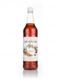 A bottle of Monin Caramel Syrup 1L