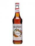 A bottle of Monin Caramel Syrup