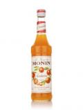 A bottle of Monin Mandarine (Tangerine) Syrup