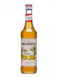 A bottle of Monin Mango Syrup