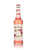 A bottle of Monin Pamplemousse Rose (Pink Grapefruit) Syrup