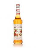 A bottle of Monin Pêche (Peach) Syrup